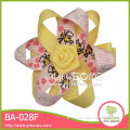 Yellow and pink gift wrap ribbon bows